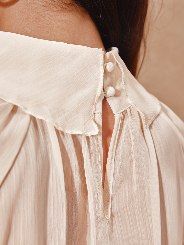 Blouse à manches longues à volants en couches en couches en couches en mousseline de soie